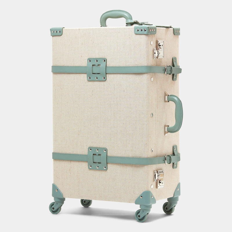Angled product view of the check-in spinner Editor linen suitcase with sea green trims