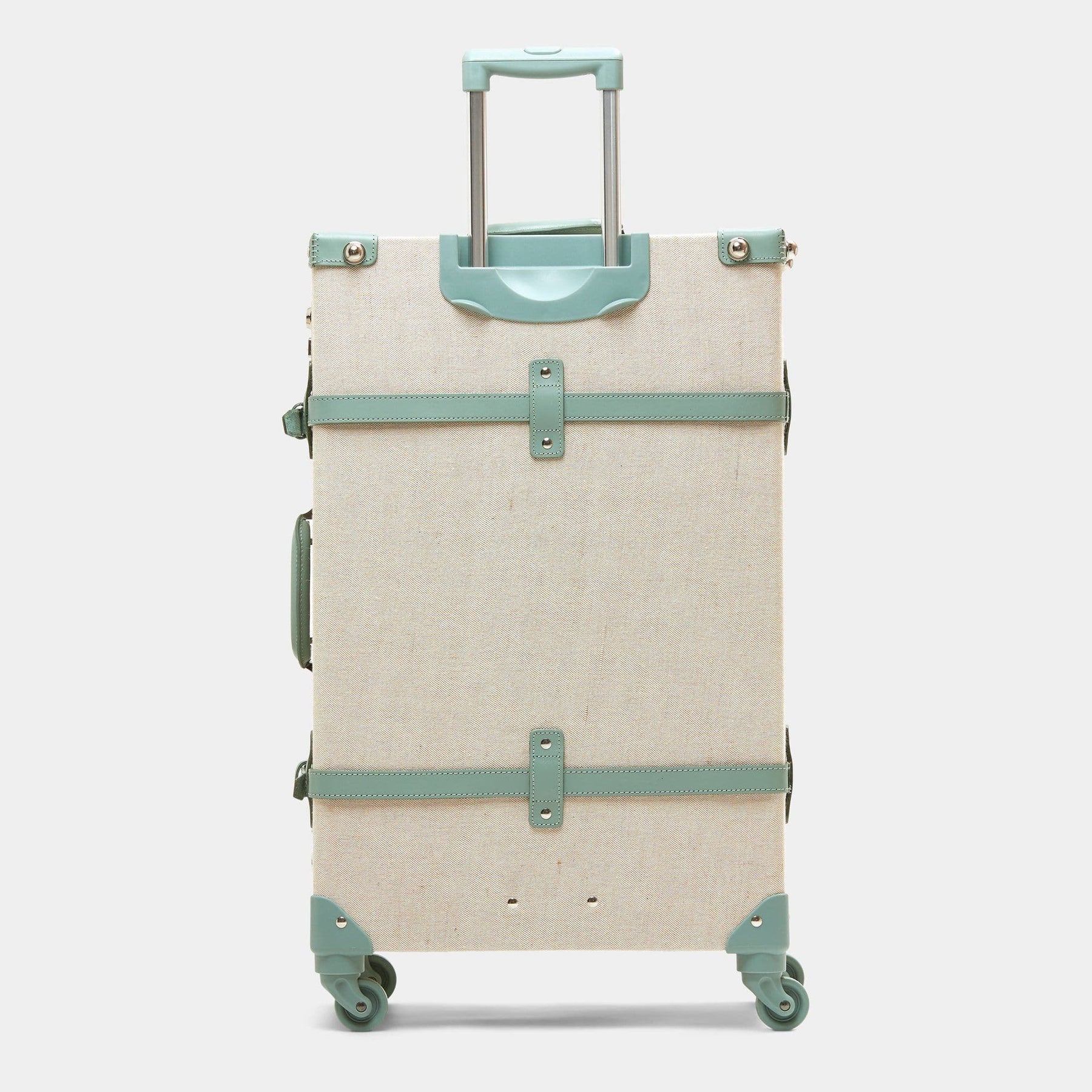 Back product view of the check-in spinner Editor linen suitcase with sea green trims and raised handle