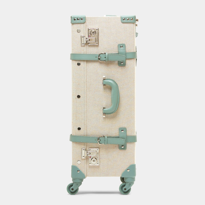 Side product view of the check-in spinner Editor linen suitcase with sea green trims