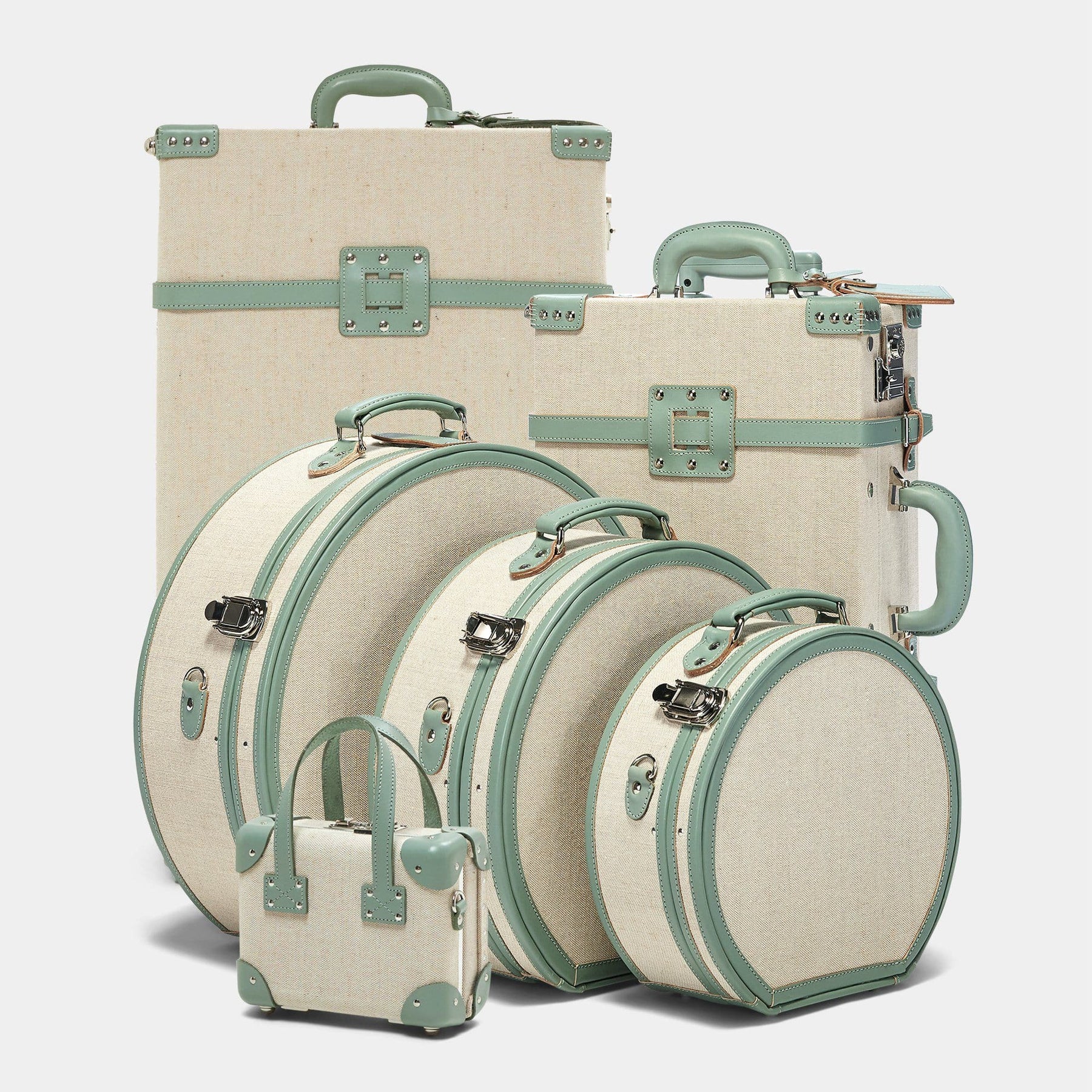 Designer luggage set of The Editor linen suitcase with sea green trims