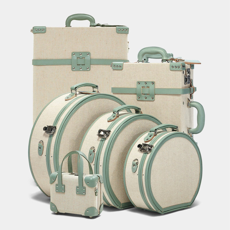 Designer luggage set of The Editor linen suitcase with sea green trims