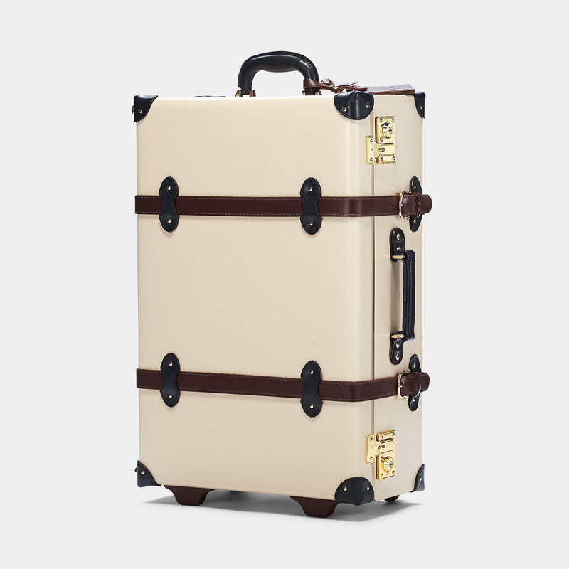 Angled product view of the stowaway Architect leather suitcase in cream