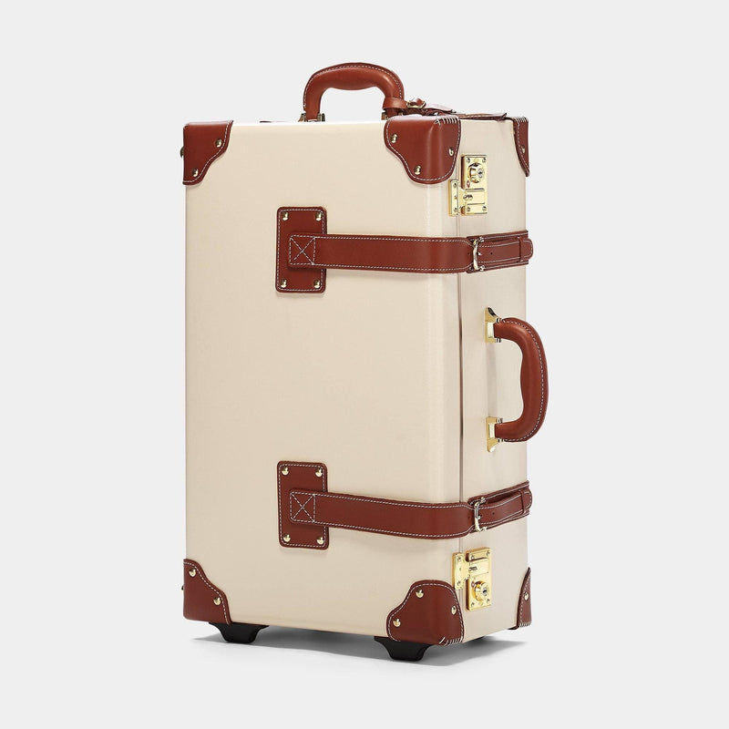 Angled product view of the stowaway Diplomat leather suitcase in cream