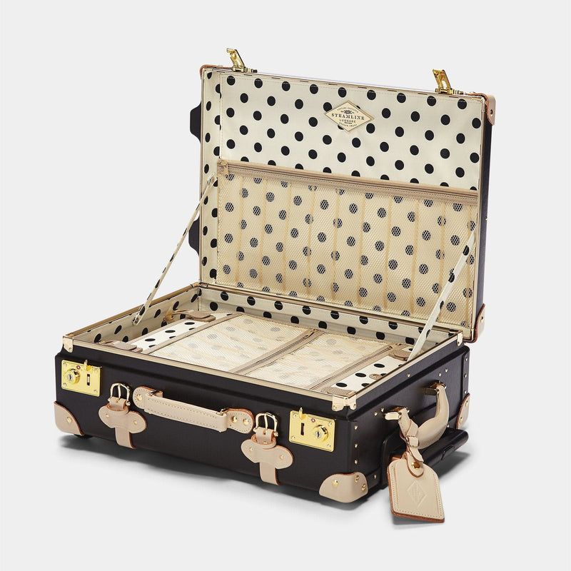 Open product view of the carry-on Starlet fibreboard suitcase in black with polka-dot printed lining