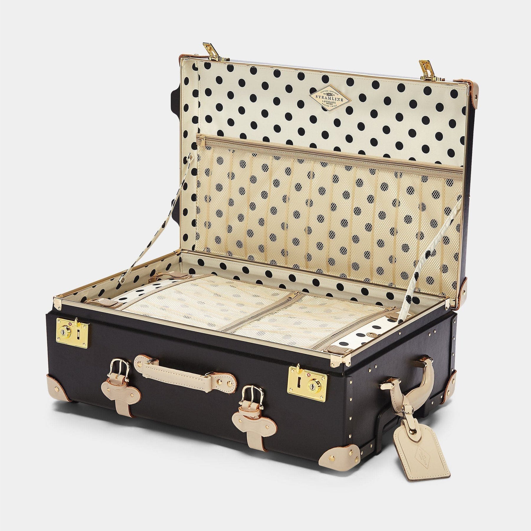 Open product view of the stowaway Starlet fibreboard suitcase in black with polka-dot printed lining