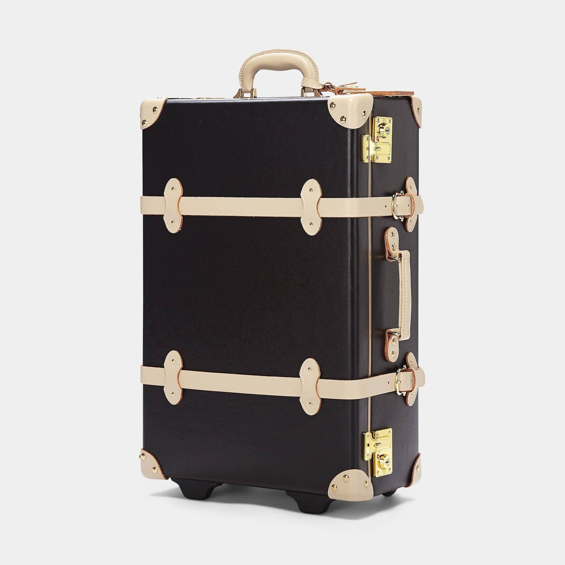 Angled product view of the stowaway Starlet fibreboard suitcase in black