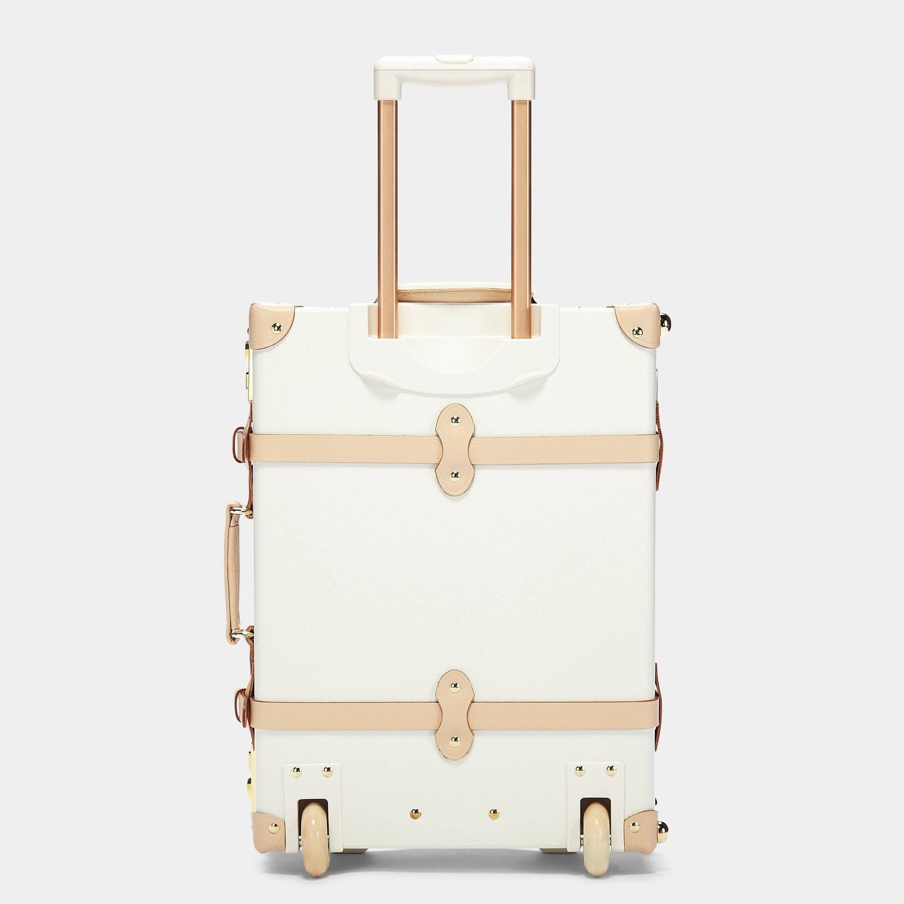 Back product view of the carry-on Sweetheart fibreboard suitcase in cream with raised handle