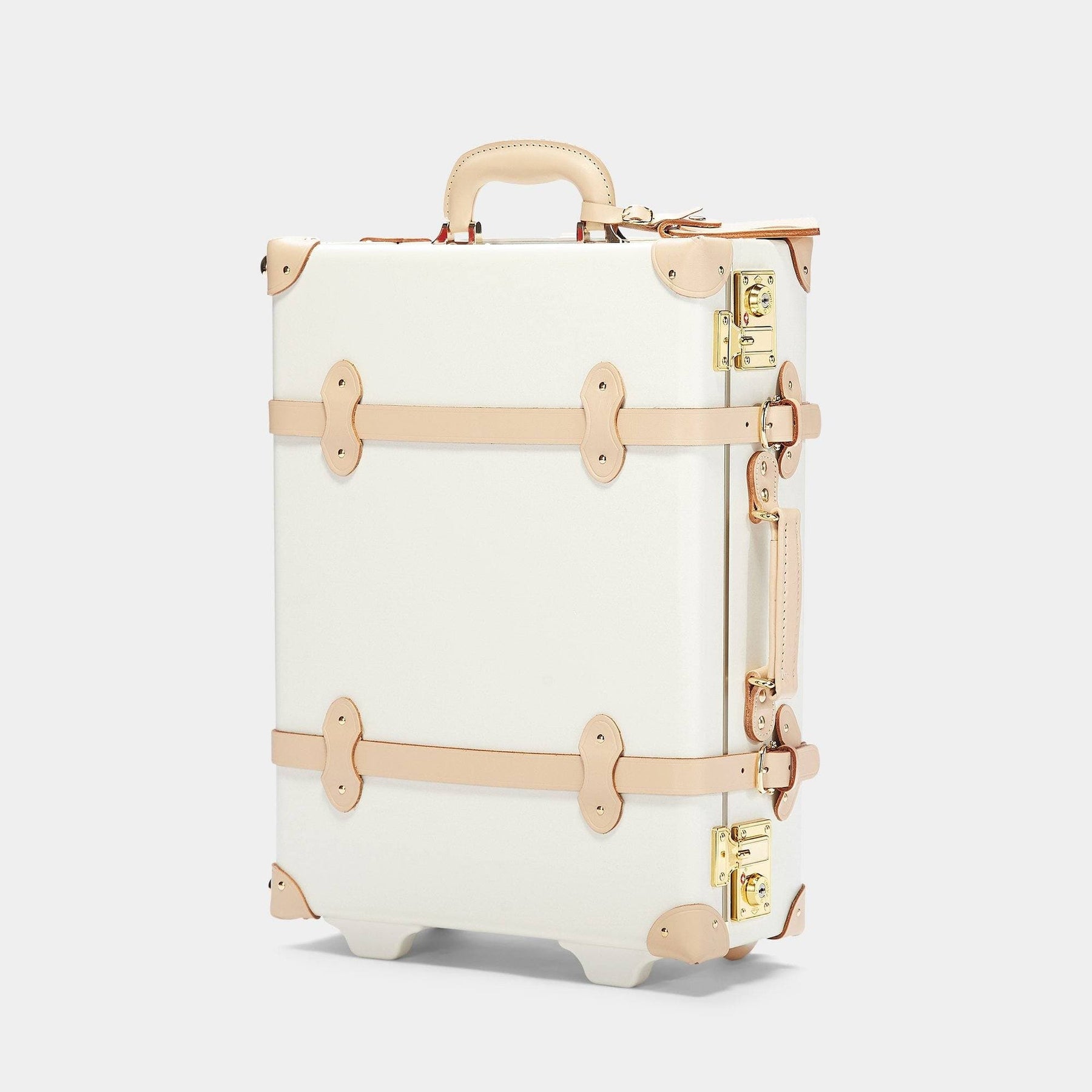 Angled product view of the carry-on Sweetheart fibreboard suitcase in cream