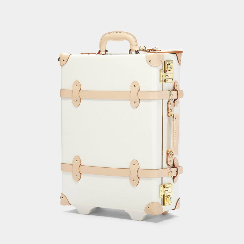 Angled product view of the carry-on Sweetheart fibreboard suitcase in cream