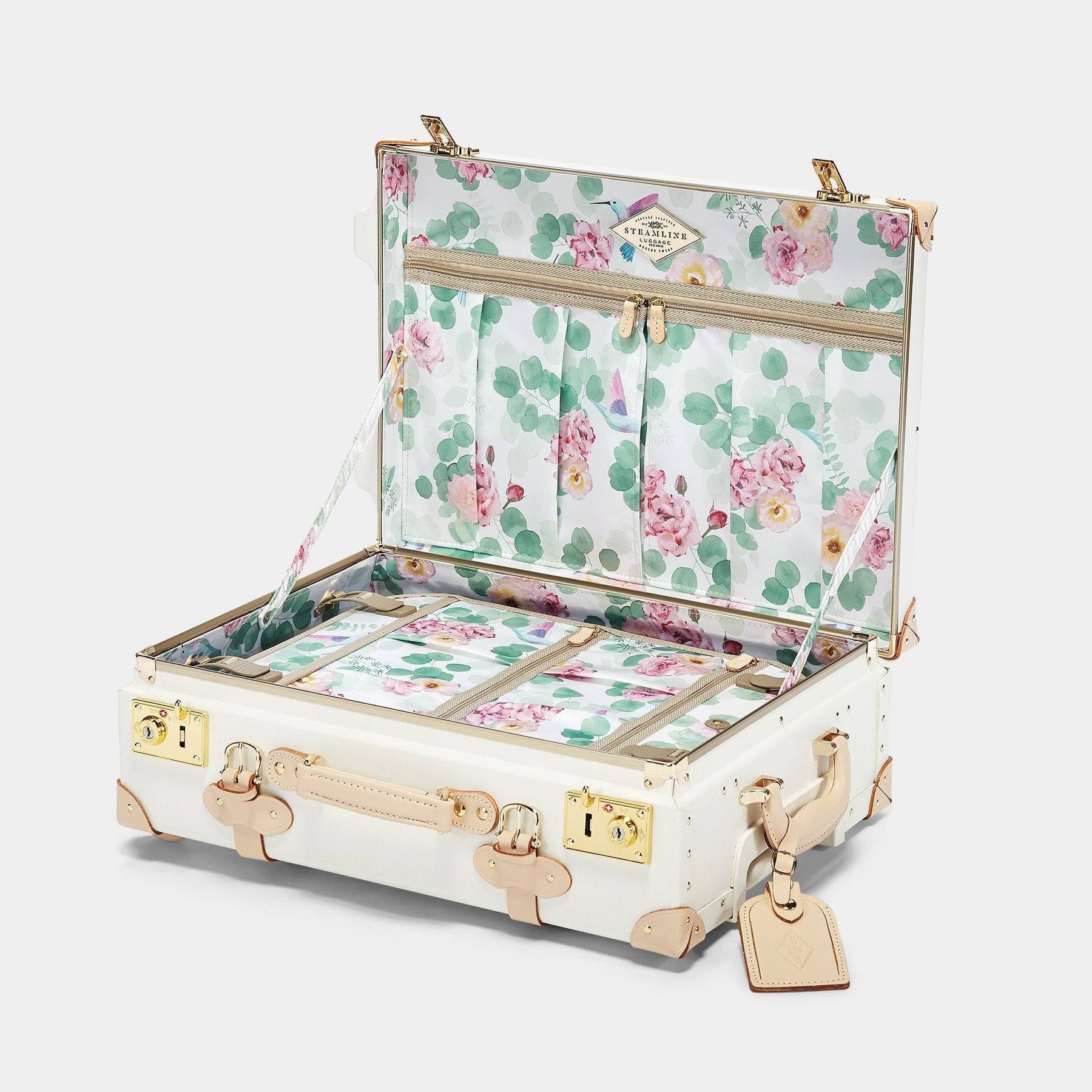 Open product view of the carry-on Sweetheart fibreboard suitcase in cream with botanical printed lining
