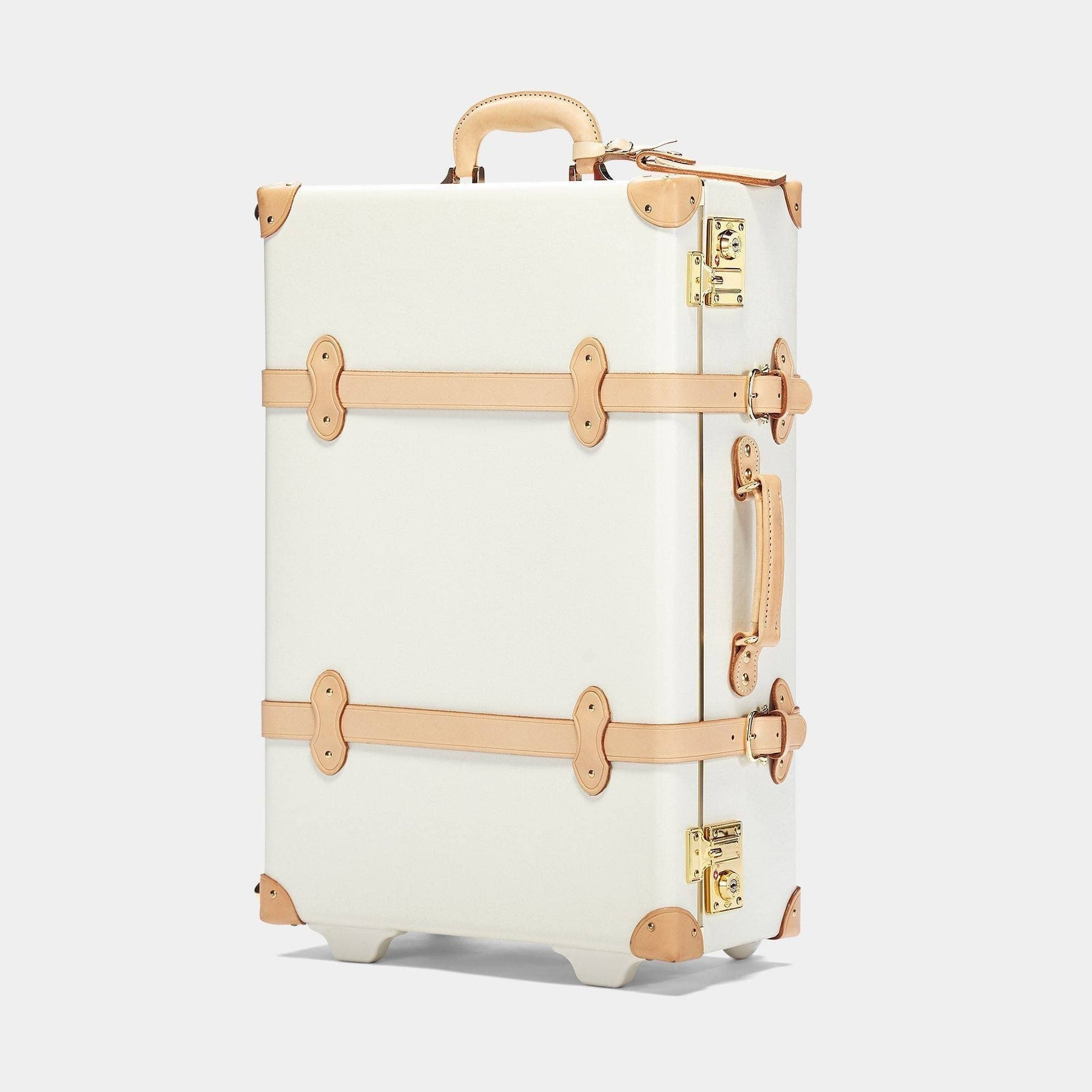 Angled product view of the stowaway Sweetheart fibreboard suitcase in cream