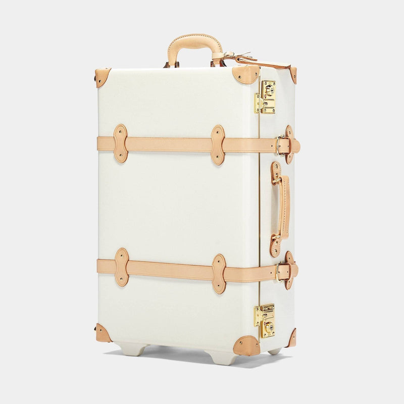 Angled product view of the stowaway Sweetheart fibreboard suitcase in cream