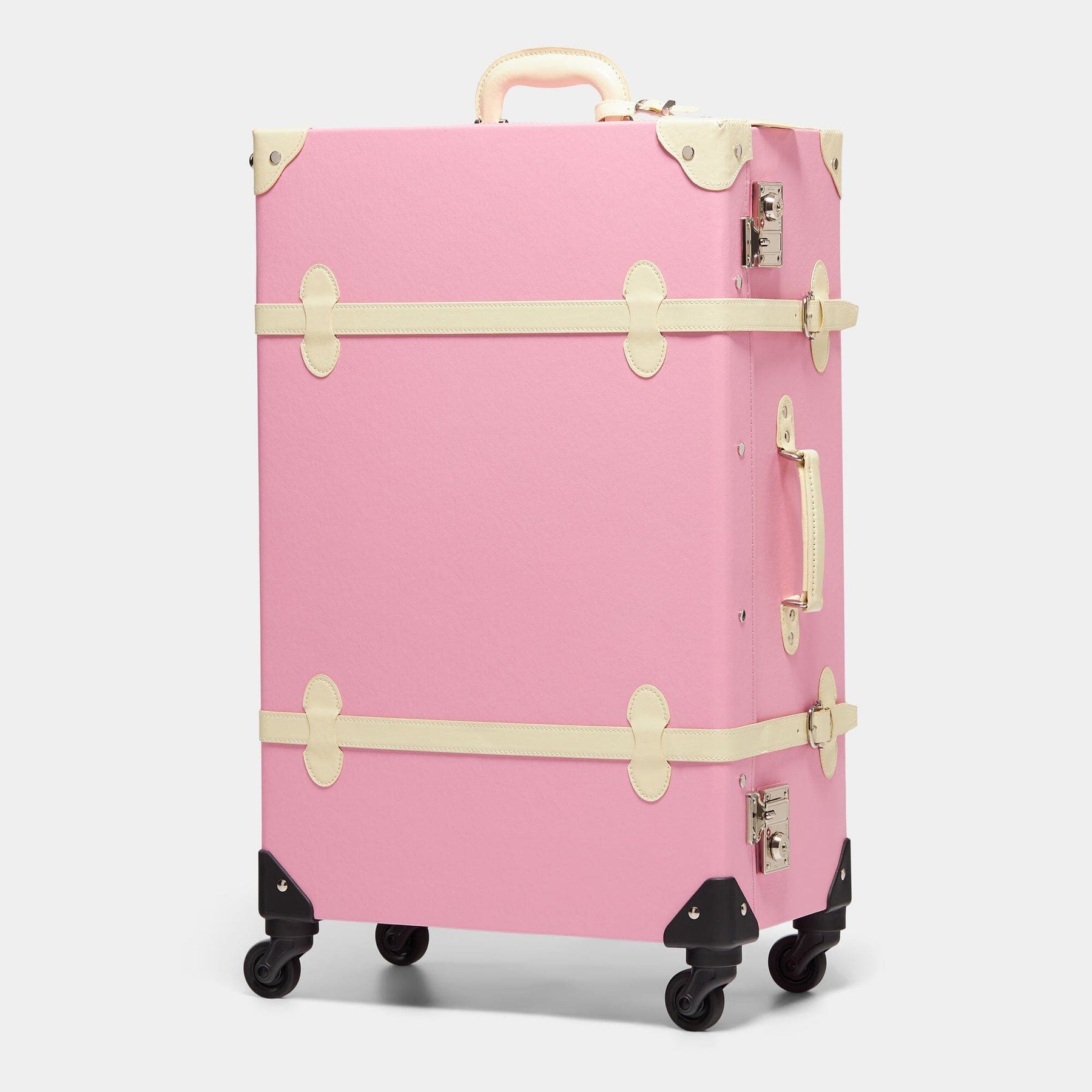 Angled product view of the check-in spinner Entrepreneur vegan leather suitcase in pink