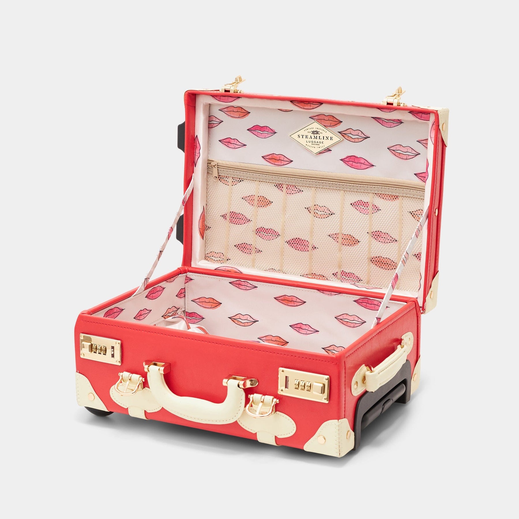 Open product view of the kids carry-on Entrepreneur vegan leather suitcase in lipstick red with lip print lining