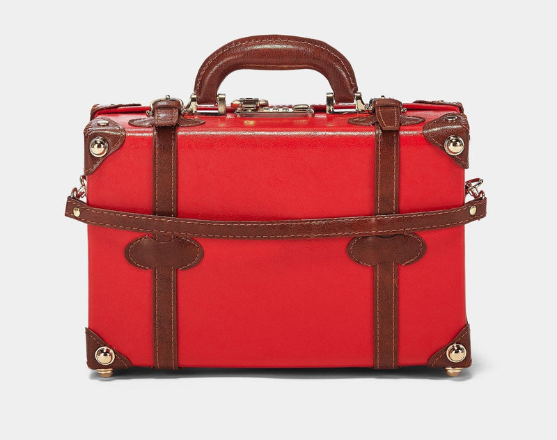 Product view of the vanity Entrepreneur vegan leather suitcase in red with detachable suitcase strap