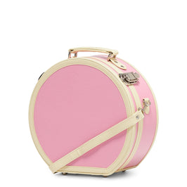 Angled product view of the small hatbox Entrepreneur vegan leather suitcase in pink with shoulder attachment strap