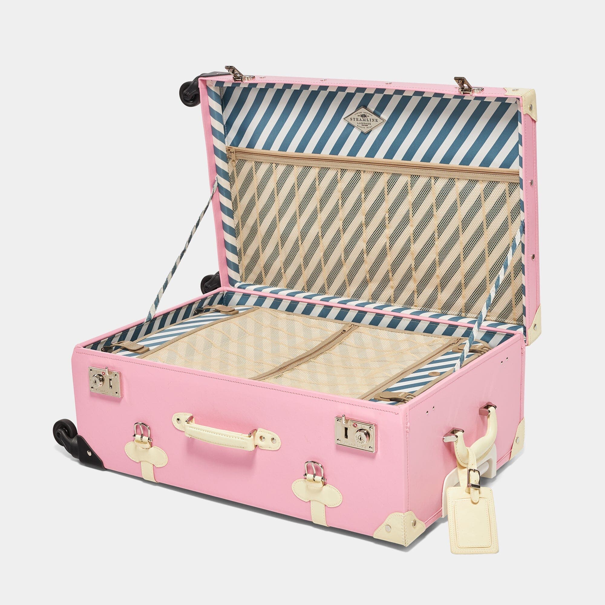 Shop our pink vegan-leather Spinner Check-In suitcase | SteamLine