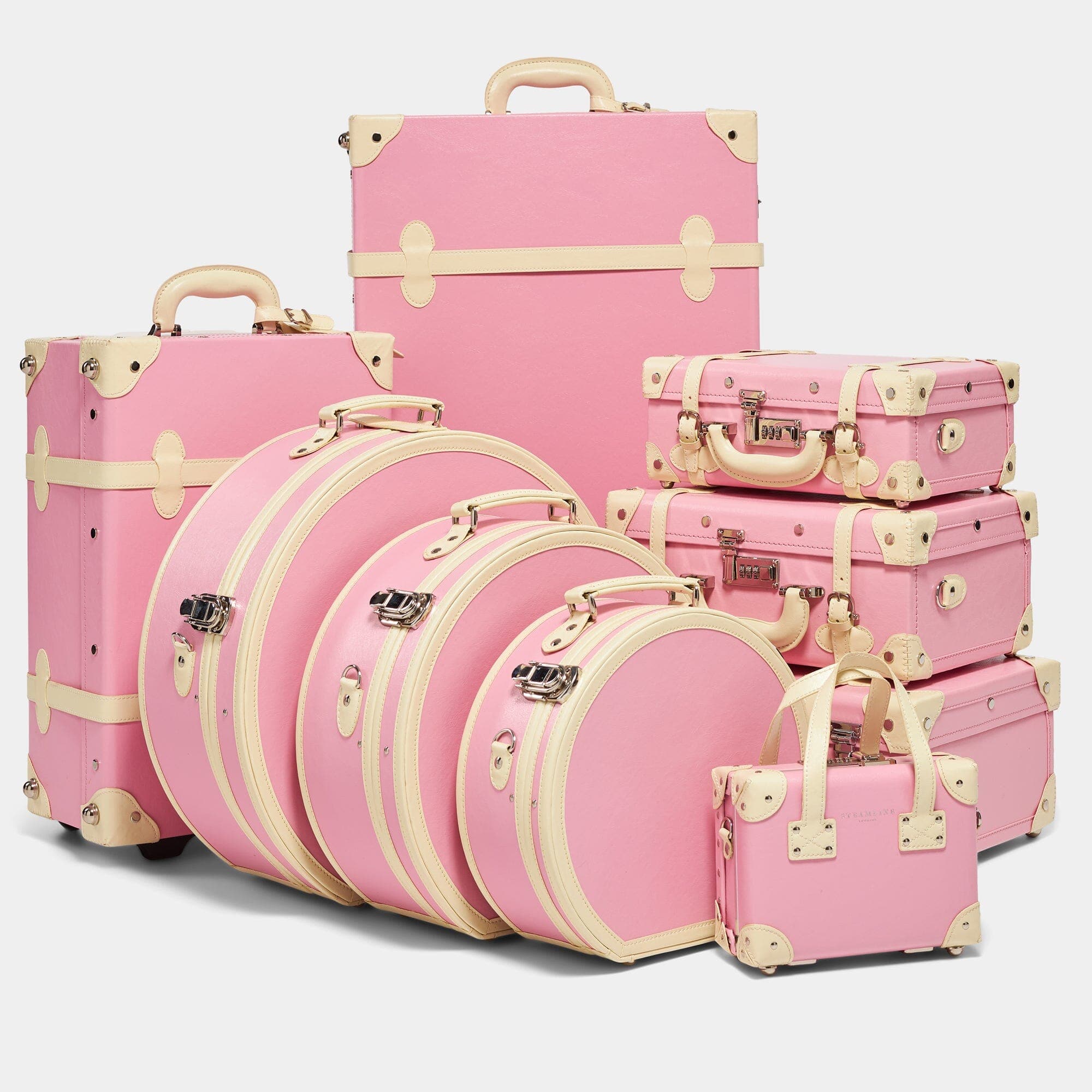 Shop our pink vegan-leather Spinner Check-In suitcase | SteamLine